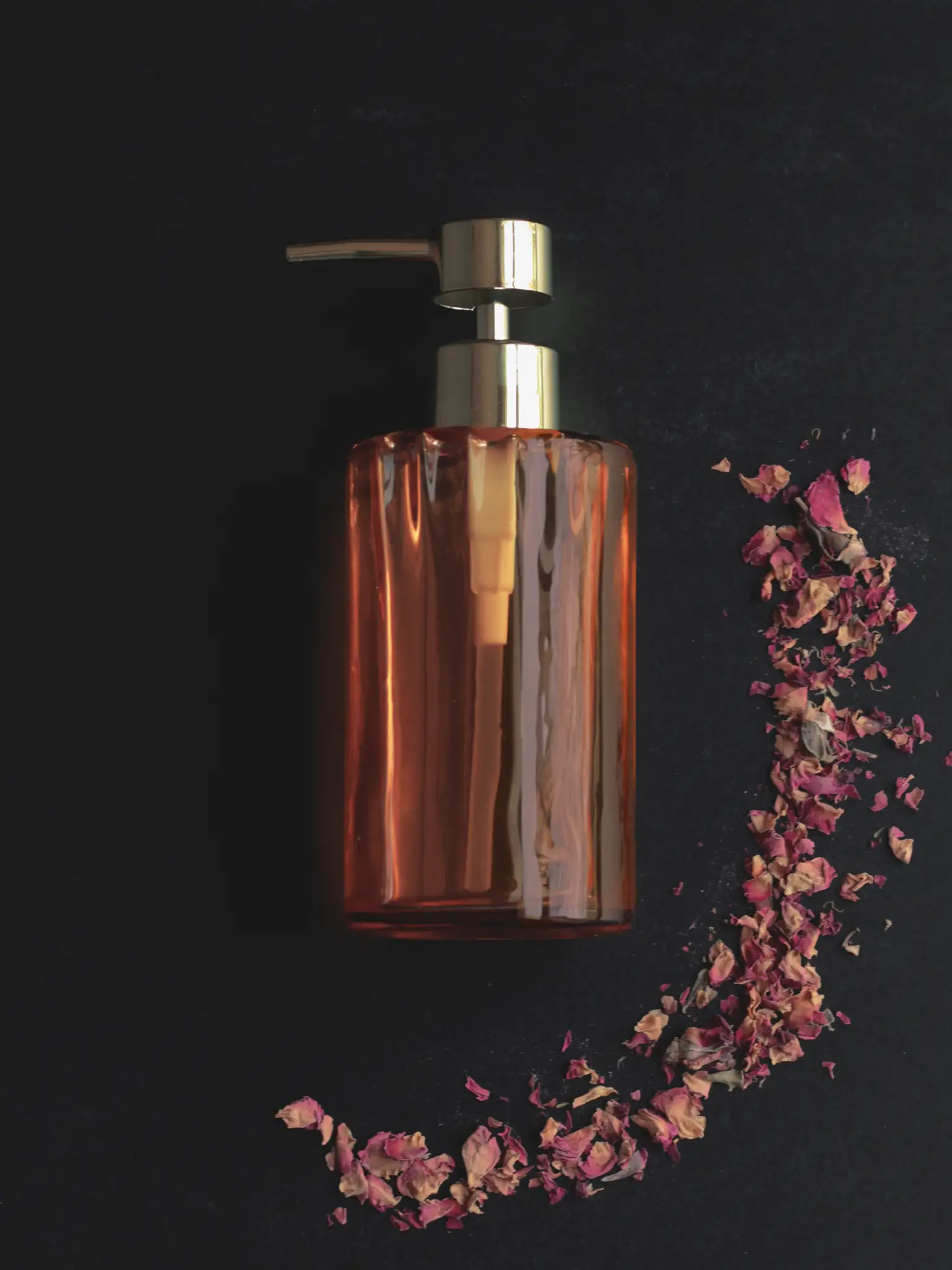 Floral Body Oil in a glass jar with pump