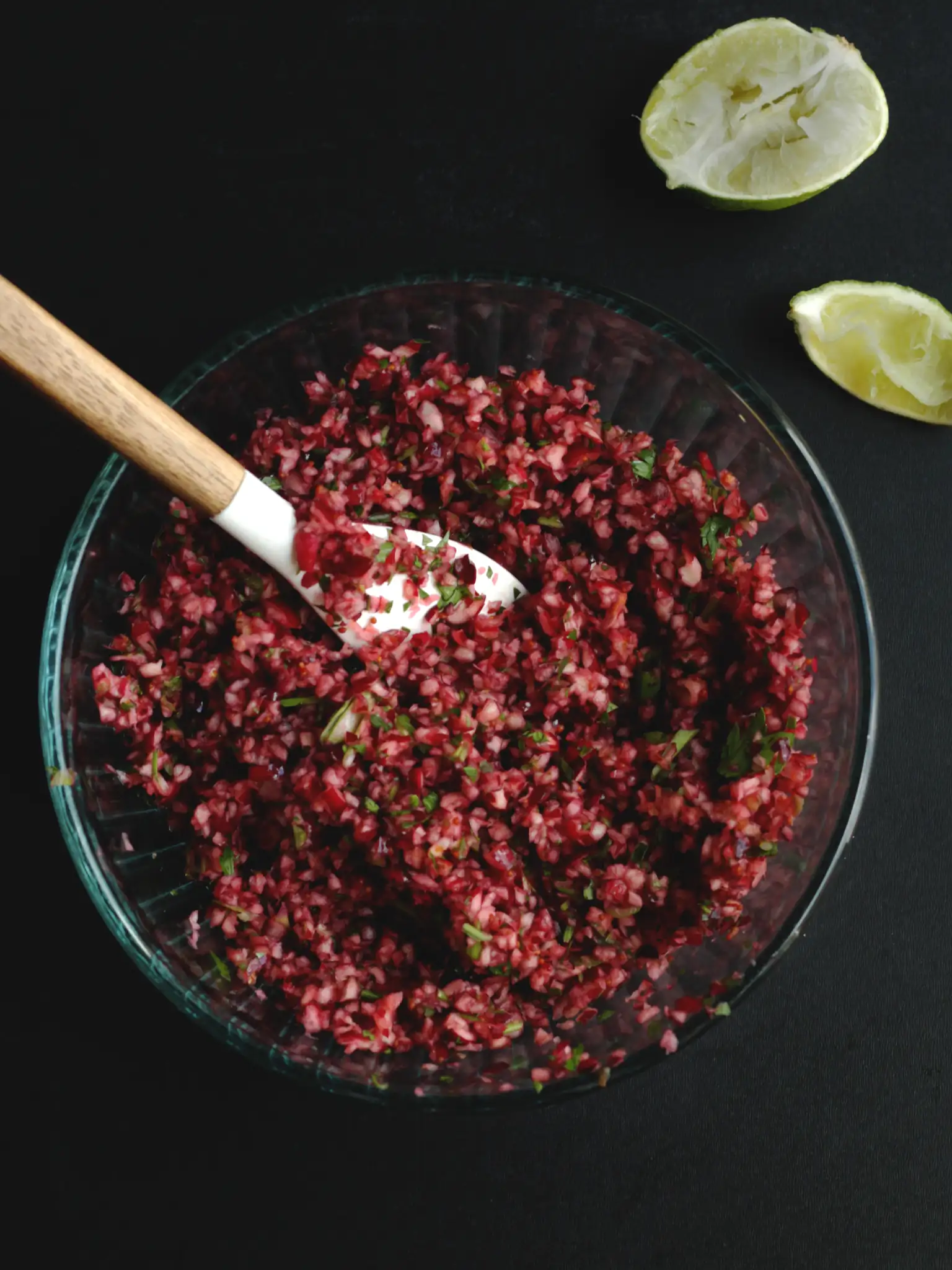 cranberry jalapeno dip in a mixing bowl