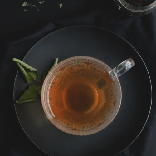 Fall wellness brew herbal tea in a glass mug