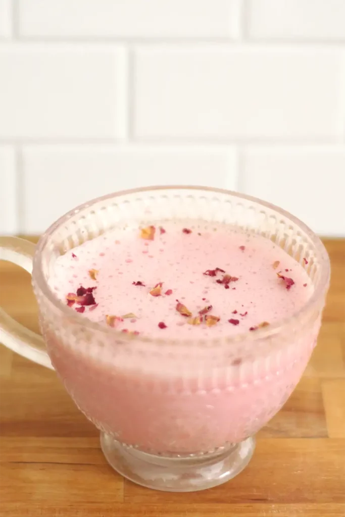 Rose milk in a clear glass