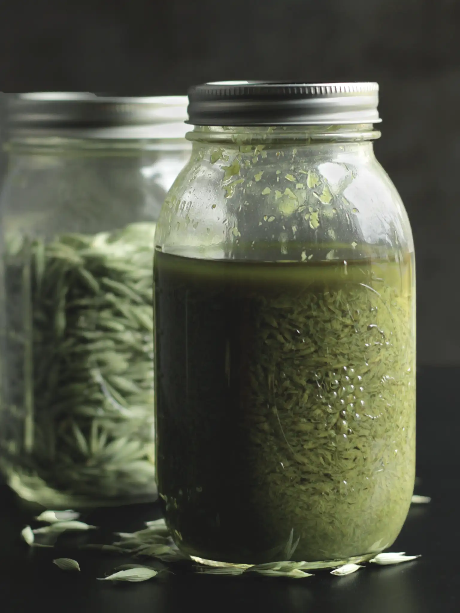 Milky oat tincture in a mason jar